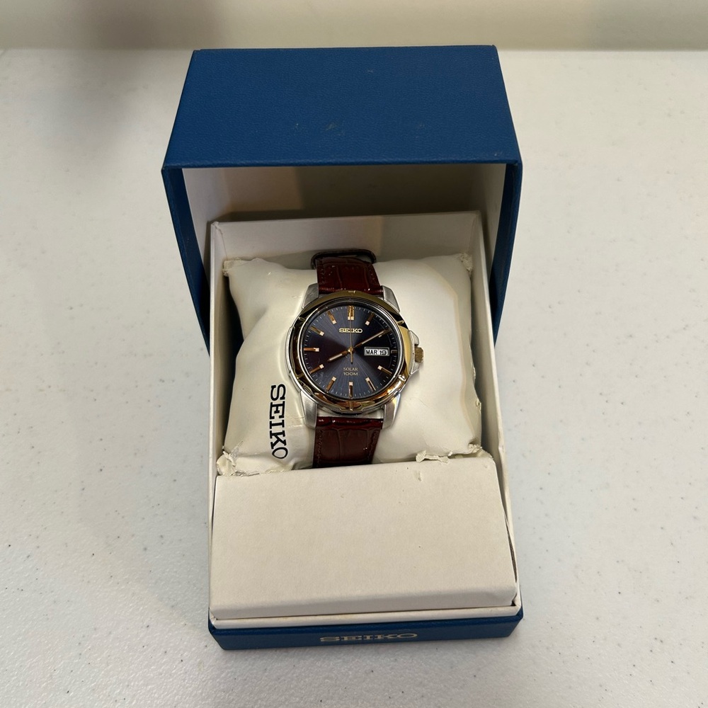 Seiko Navy Dial Watch with Brown Leather Strap and Gold Accents